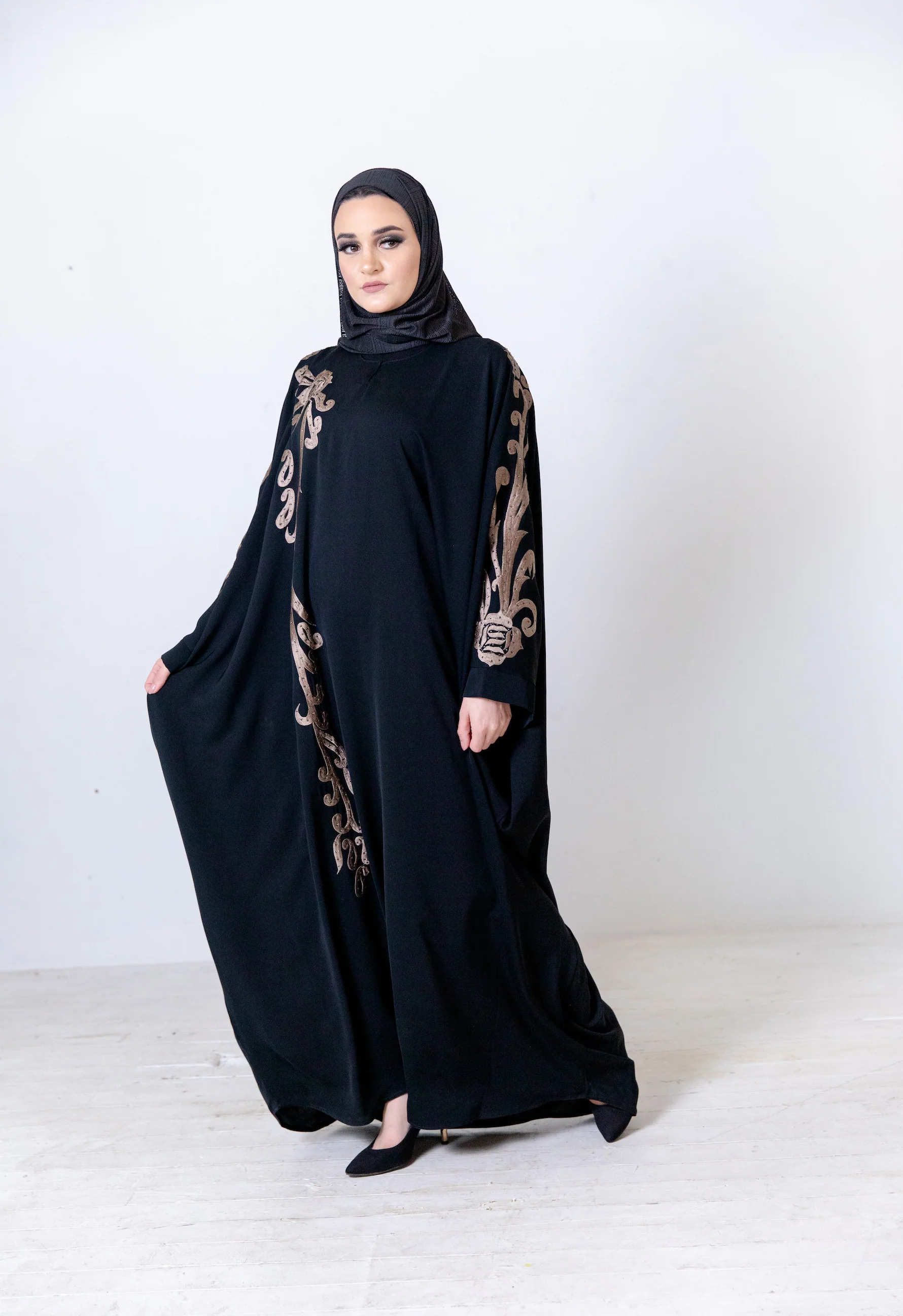 Black Closed Abaya – Luxurious Batwing Design with Gold Front and Sleeve Embroidery - Image 2